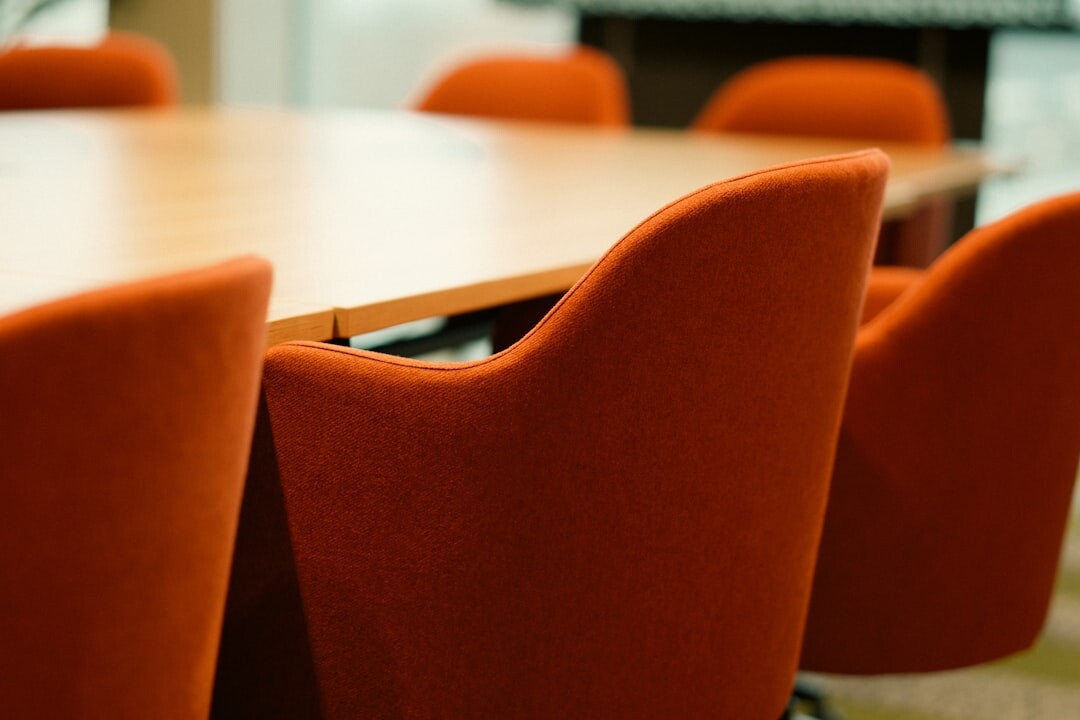 Empty modern meeting room with wooden table